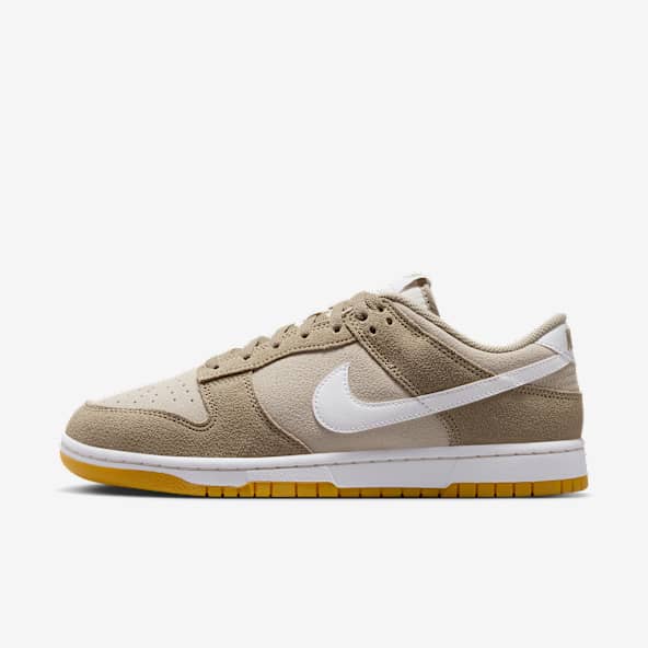 Tenis nike dorados hombre online